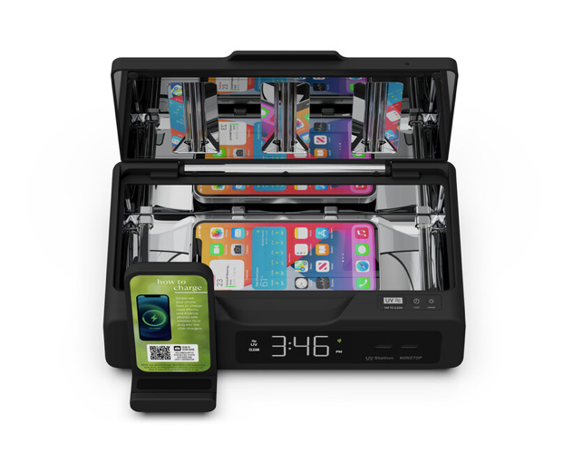 Black UV Bedside Station with Cellphones Inside and on Wireless Charging Station